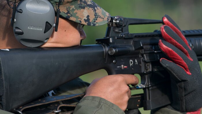 A Marine aims down his sights during the Marine Corps Shooting Team Championships on Marine Corps Base Quantico, Va. May 4, 2017. Each year, the Marine Corps Shooting Team hosts the championship matches for medalists from each Marine Corps Markmanship Competition site to compete in individual and team matches.