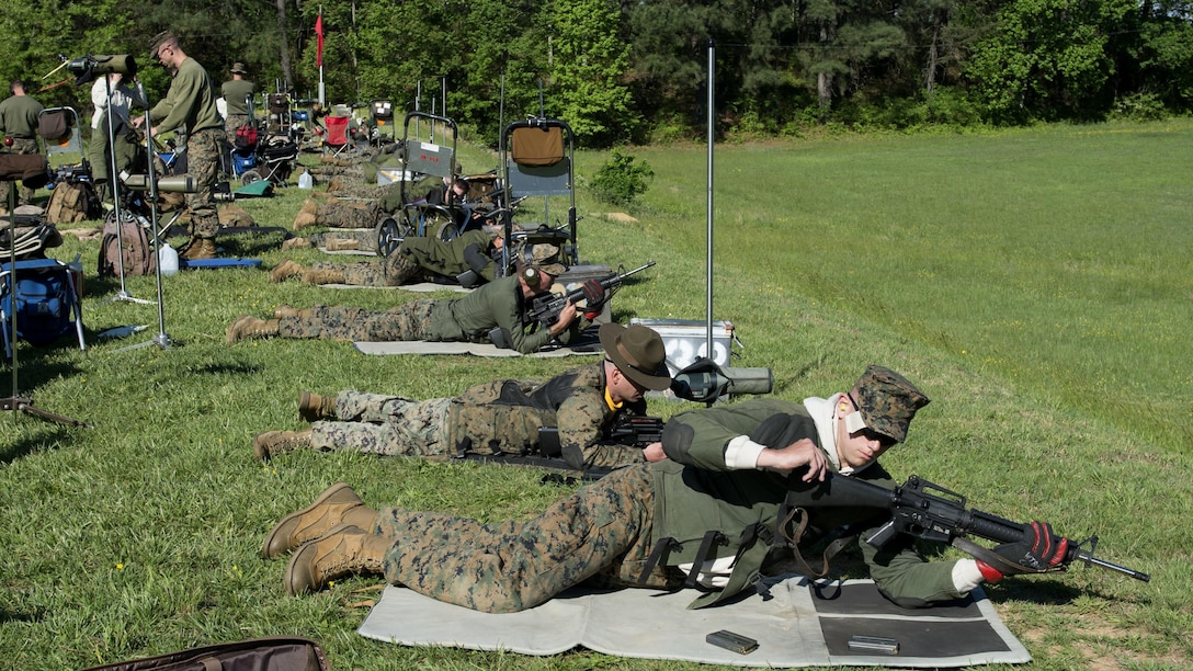 Marines prepare to fire in the prone position during the Marine Corps Shooting Team Championships on Marine Corps Base Quantico, Va. May 3, 2017. Each year, the Marine Corps Shooting Team hosts the championship matches for medalists from each regional Marine Corps Markmanship Competition site to compete in individual and team matches. 