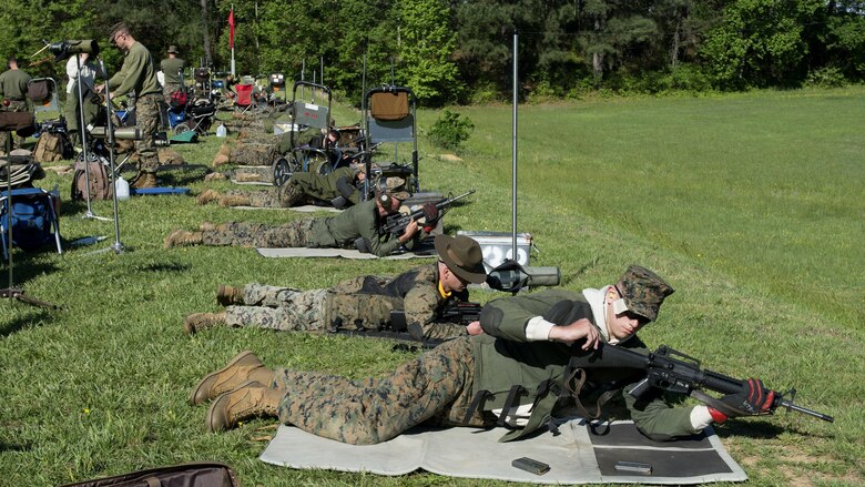 Marines prepare to fire in the prone position during the Marine Corps Shooting Team Championships on Marine Corps Base Quantico, Va. May 3, 2017. Each year, the Marine Corps Shooting Team hosts the championship matches for medalists from each regional Marine Corps Markmanship Competition site to compete in individual and team matches. 