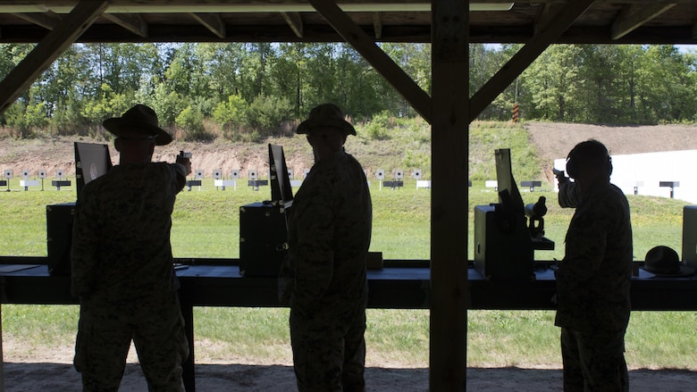 Marines fire down the pistol range during the Marine Corps Shooting Team Championships on Marine Corps Base Quantico, Va. May 3, 2017. Each year, the Marine Corps Shooting Team hosts the championship matches for medalists from each regional Marine Corps Markmanship Competition site to compete in individual and team matches.