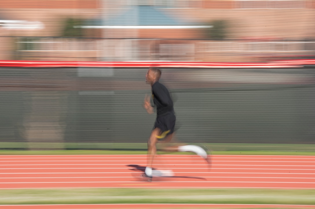 A U.S. Army Reserve Soldier with the 335th Signal Command (Theater) runs two miles to pass the Army Physical Fitness Test in East Point, Ga., May 6, 2017. The APFT is designed to test the muscular strength, endurance, and cardiovascular respiratory fitness of soldiers in the Army. Soldiers are scored based on their performance in three events consisting of the push-up, sit-up, and a two-mile run, ranging from 0 to 100 points in each event. (U.S. Army Reserve photo by Staff Sgt. Ken Scar)