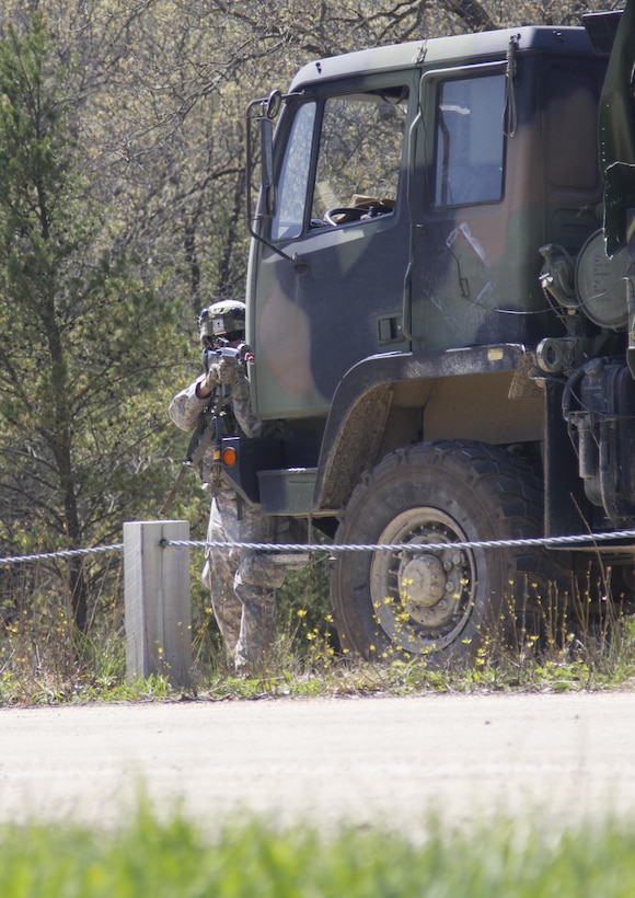 A U.S. Army Reserve Soldier from the 401st Engineer Company (Multi-Role Bridge Company) responds to enemy fire during convoy operations training on Fort McCoy, Wis., as part of Warrior Exercise 86-17-02, May 3, 2017. More than 70 U.S. Army Reserve units conducted combat training to increase their lethality as cohesive units of action during the 84th Training Command’s WAREX 86-17-02 at Fort McCoy, Wis. from April 29 until May 13, 2017. (U.S. Army Reserve photo by Sgt. Beth Raney, 343rd Mobile Public Affairs Detachment)