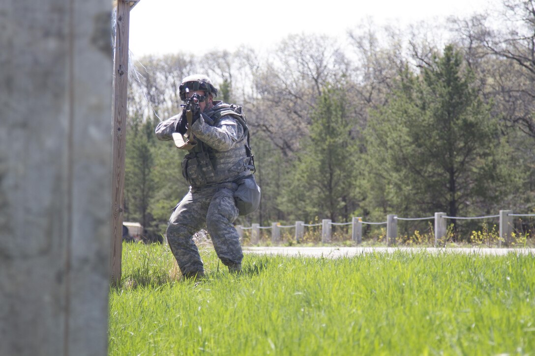 A U.S. Army Reserve Soldier from the 341st Engineer Company engages enemy forces during convoy operations training on Fort McCoy, Wis., as part of Warrior Exercise 86-17-02, May 3, 2017. More than 70 U.S. Army Reserve units conducted combat training to increase their lethality as cohesive units of action during the 84th Training Command’s WAREX 86-17-02 at Fort McCoy, Wis. April 29 through May 13, 2017. (U.S. Army Reserve photo by Sgt. Beth Raney, 343rd Mobile Public Affairs Detachment)