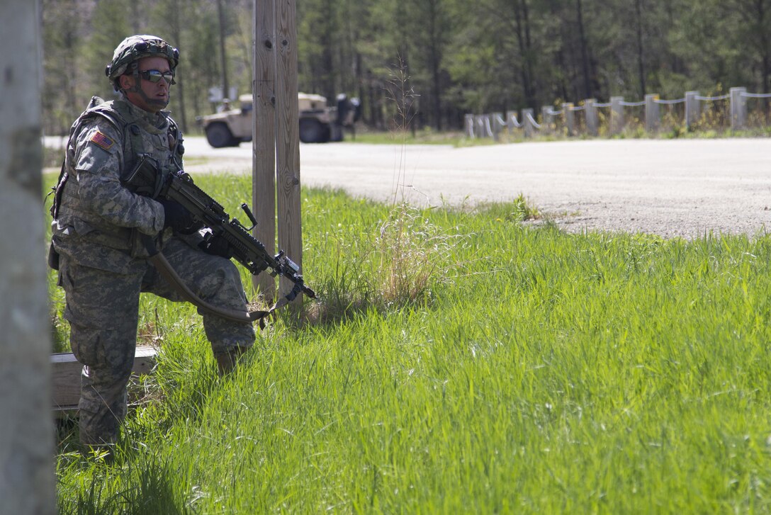 U.S. Army Reserve Soldiers from the 341st Engineer Company and 401st Engineer Company (Multi-Role Bridge Company) assumes his position in a defensive perimeter during a convoy operations training lane on Fort McCoy, Wis., as part of Warrior Exercise 86-17-02, May 3, 2017. More than 70 U.S. Army Reserve units are conducting combat training to increase their lethality as cohesive units of action during the 84th Training Command’s WAREX 86-17-02 at Fort McCoy, Wis. from April 29, 2017 until May 13, 2017. (U.S. Army Reserve photo by Sgt. Beth Raney, 343rd Mobile Public Affairs Detachment)