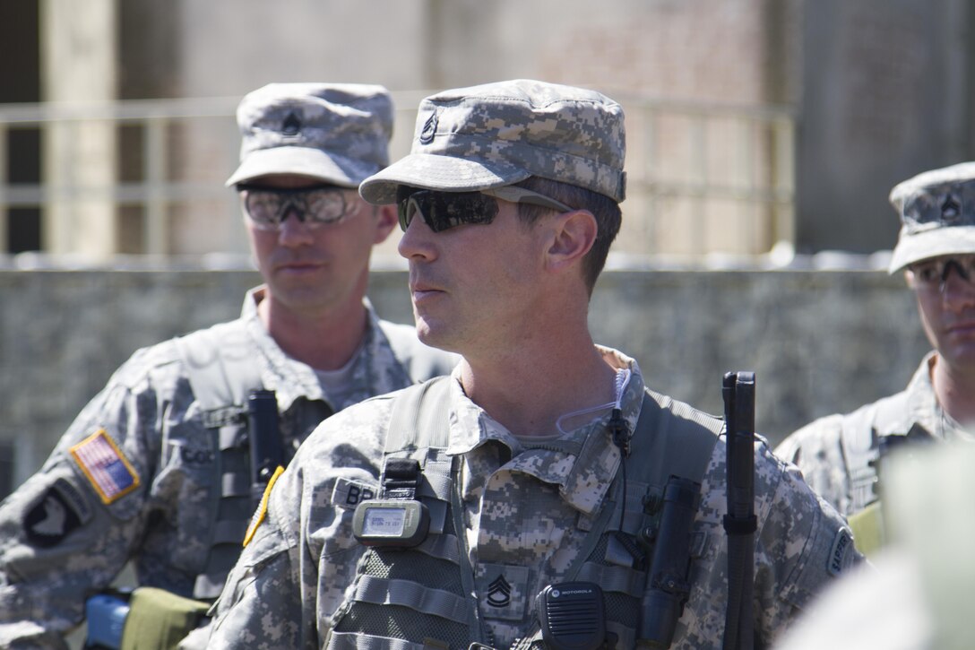 U.S. Army Sgt. 1st Class Paul Brantley, an Observer-Coach-Trainer with the 181st Multi-Functional Training Brigade, and native of Mobile, Ala., speaks with U.S. Army Reserve Soldiers from the 341st Engineer Company and 401st Engineer Company (Multi-Role Bridge Company) after they completed a convoy operations training lane on Fort McCoy, Wis., as part of Warrior Exercise 86-17-02, May 3, 2017. More than 70 U.S. Army Reserve units conducted combat training to increase their lethality as cohesive units of action during the 84th Training Command’s WAREX 86-17-02 at Fort McCoy, Wis., April 29 through May 13, 2017. (U.S. Army Reserve photo by Sgt. Beth Raney, 343rd Mobile Public Affairs Detachment)