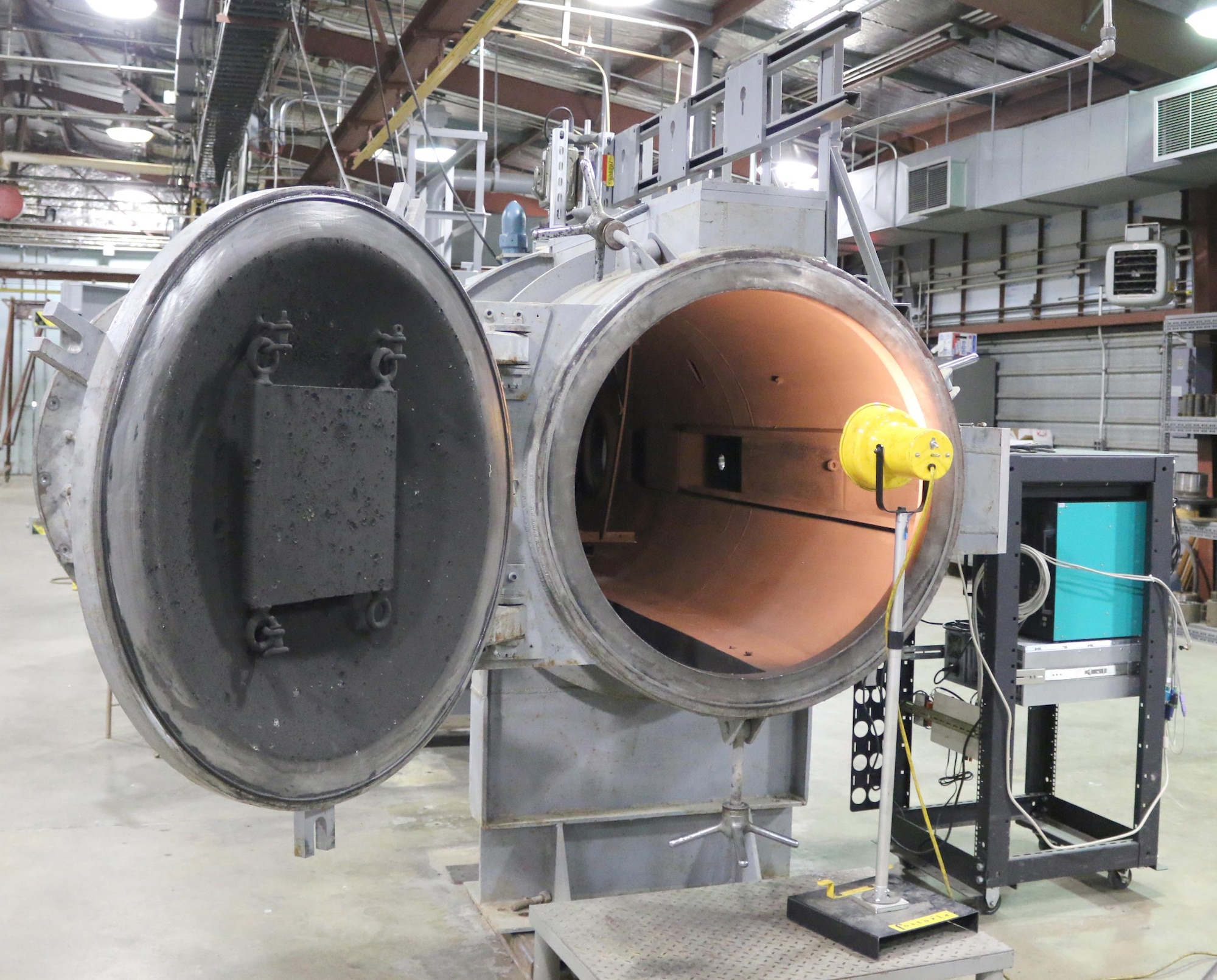 Pictured is the inside of the target chamber of the AEDC Range S-1 where hypervelocity impacts take place. S-1 wasn’t active in a decade but is currently undergoing checkout operations in preparation for three upcoming test projects. Several successful test launches have recently been performed in S-1. (U.S. Air Force photo/Deidre Ortiz)