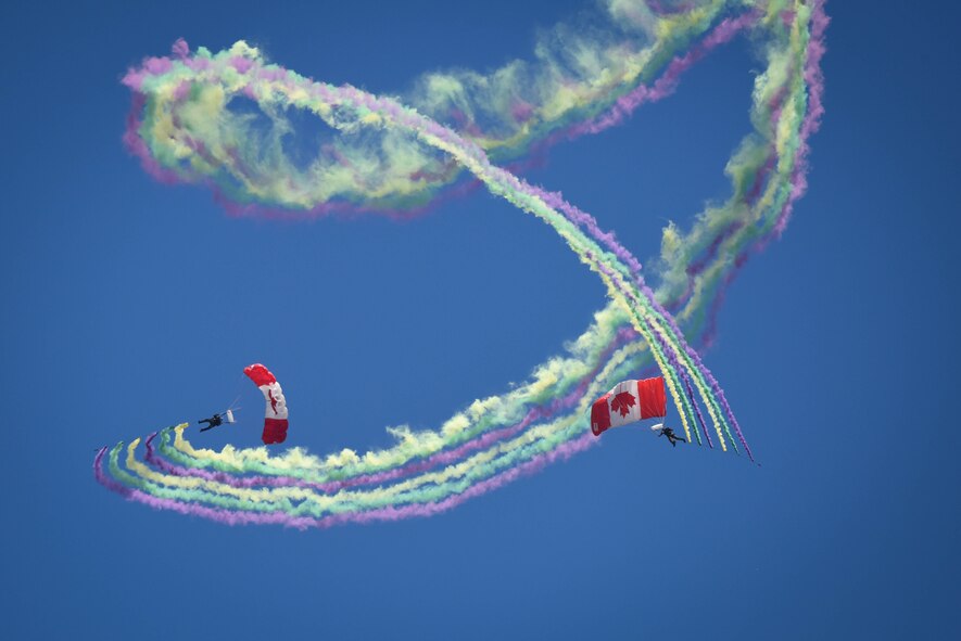 Members of the Canadian Skyhawks team descend from the sky with an assortmant of colors at Barksdale Air Force Base, La., May 7, 2017. The team takes great pride in showcasing the professionalism, dedication and teamwork it takes to be part of Canada’s military. (U.S. Air Force photo/Airman 1st Class Stuart Bright)