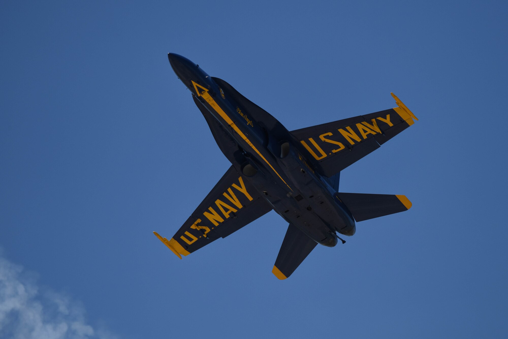 The U.S. Navy Flight Demonstration Team Blue Angels F/A-18 Hornets perform an aerial maneuver for the Defenders of Liberty Air Show at Barksdale Air Force Base, La., May 7, 2017. The highly competitive selection process for joining the Blue Angels' team guarantees the squadron's tradition of excellence, ensuring the Blue Angels are a direct reflection of the professionalism of today's sailors and Marines. (U.S. Air Force photo/Airman 1st Class Stuart Bright)