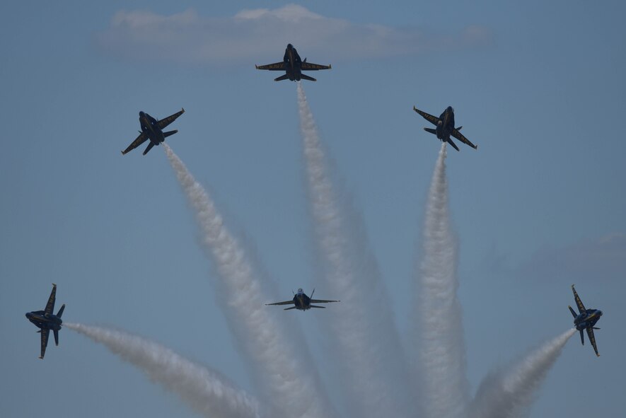 The U.S. Navy Flight Demonstration Team Blue Angels F/A-18 Hornets perform an aerial maneuver at the Defenders of Liberty Air Show at Barksdale Air Force Base, La., May 7, 2017. All of the Blue Angels' jets are aircraft carrier capable and can be made combat ready within 72 hours. (U.S. Air Force photo/Airman 1st Class Stuart Bright)