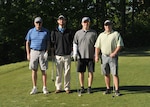 The winning team, from left: Dave Peterson, direct delivery fuels director, DLA Energy; Bruce Blank, supervisory procurement analyst, DLA Energy; Cliff Sands, supervisory general engineer, DLA Installation Support; Justin Wingo, contract specialist, DLA Energy
