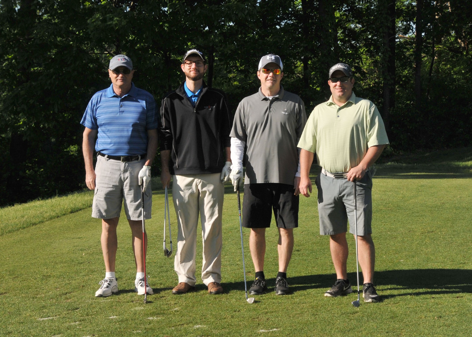 The winning team, from left: Dave Peterson, direct delivery fuels director, DLA Energy; Bruce Blank, supervisory procurement analyst, DLA Energy; Cliff Sands, supervisory general engineer, DLA Installation Support; Justin Wingo, contract specialist, DLA Energy
