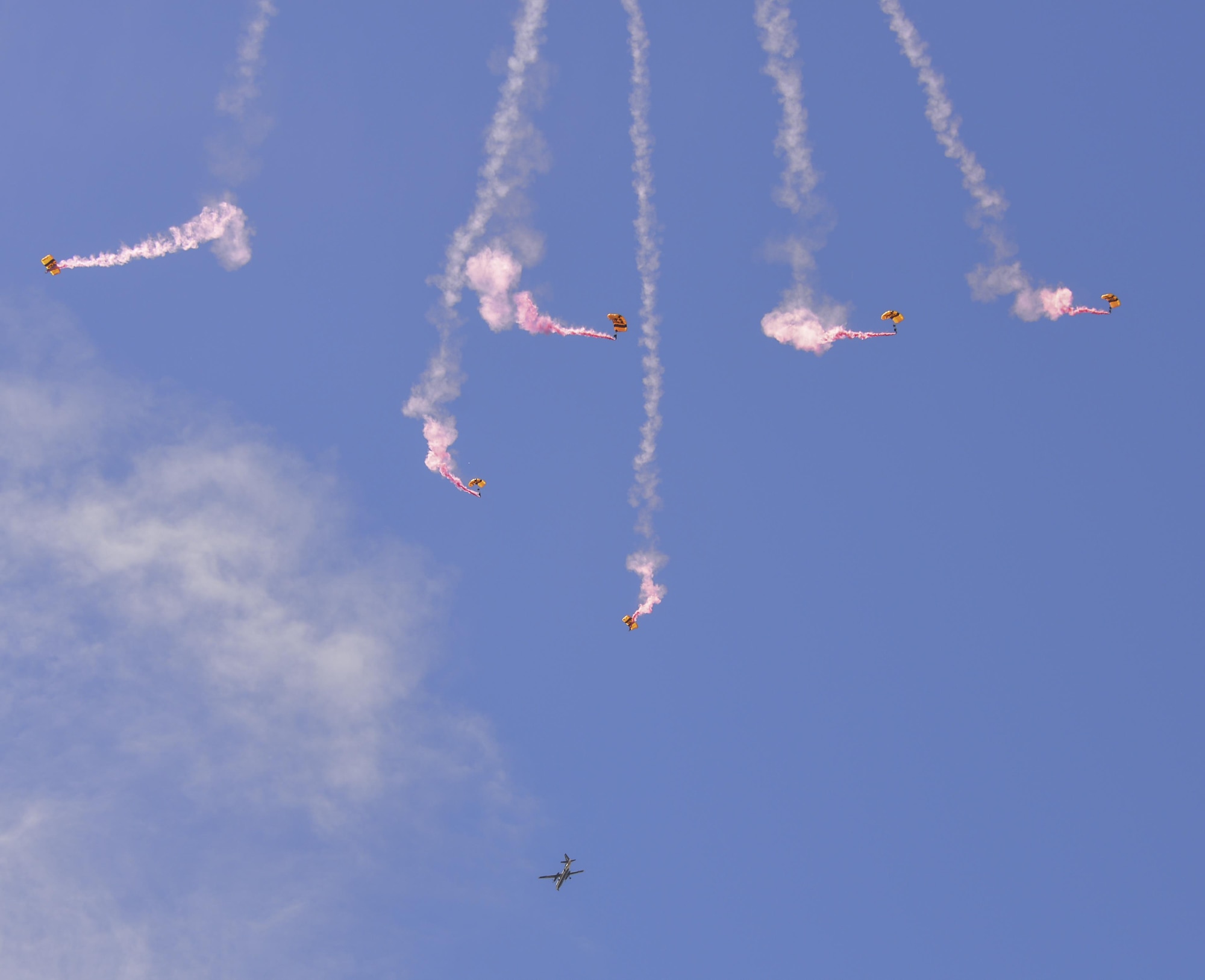 The U.S. Army Golden Knights parachute team perform skydiving maneuvers May 4 at Fairfield High School in Fairfield, Calif. The Golden Knights were in Northern California for the "Wings Over Solano" Air Show May 6-7 at Travis Air Force Base. (U.S. Air Force photo/Senior Airman Amber Carter)
