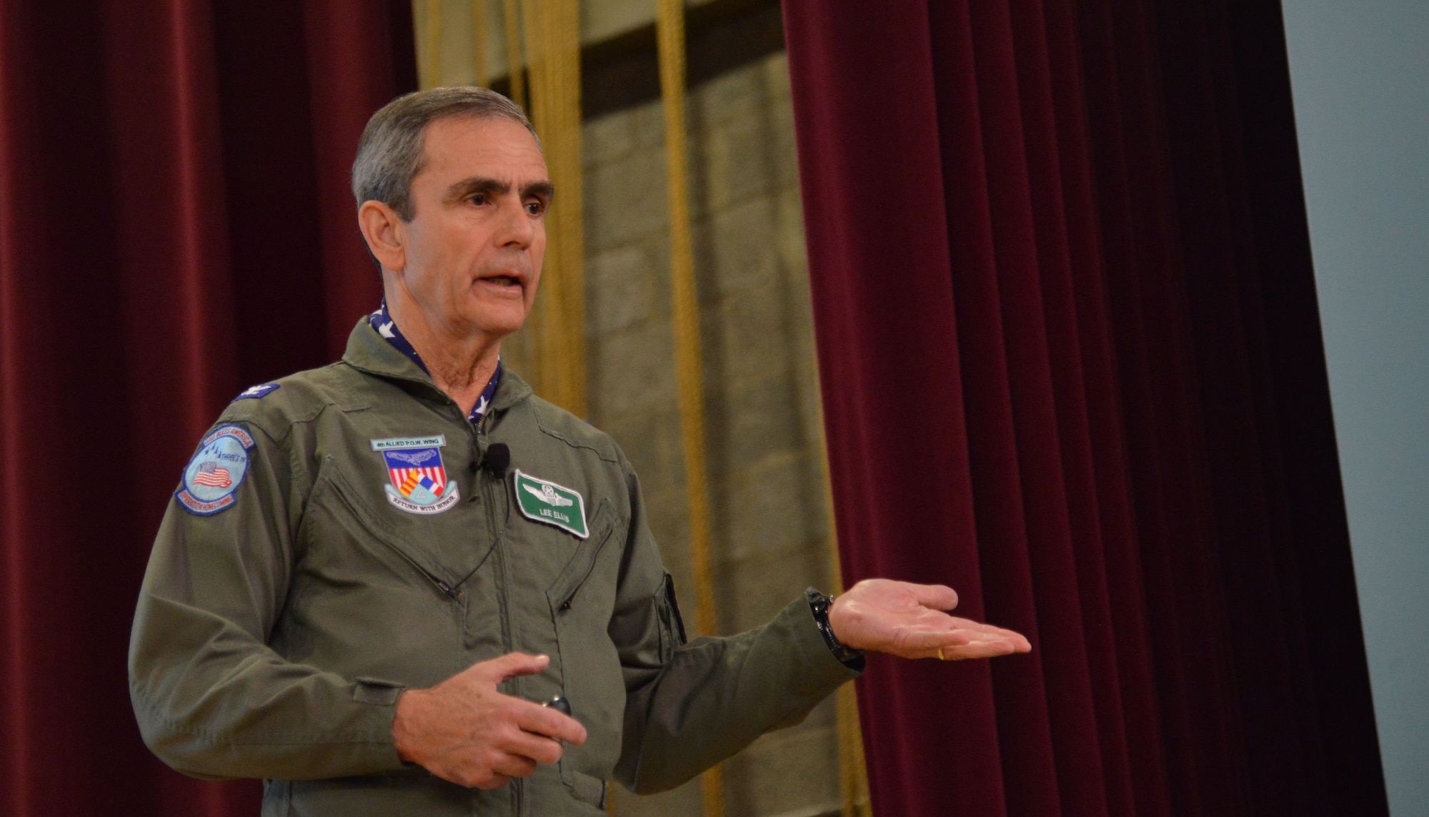 Retired colonel and former Vietnam prisoner of war Lee Ellis speaks to Team Kirtland members May 2-3 at the Base Theater. Ellis spoke about the importance of character, courage, commitment in leaders.