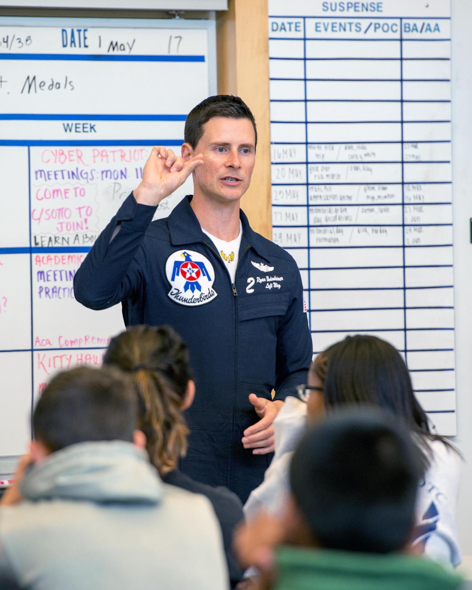 U.S. Air Force Maj. Ryan Bodenheimer, United States Air Force Thunderbirds pilot #2, speaks with Junior Reserve Officer Training Corps students at Vanden High School, Fairfield, Calif., May 5. The Thunderbirds performed in the Wings Over Solano Air Show at Travis Air Force Base, Calif May 6 - 7. (U.S. Air Force photo by Louis Briscese)