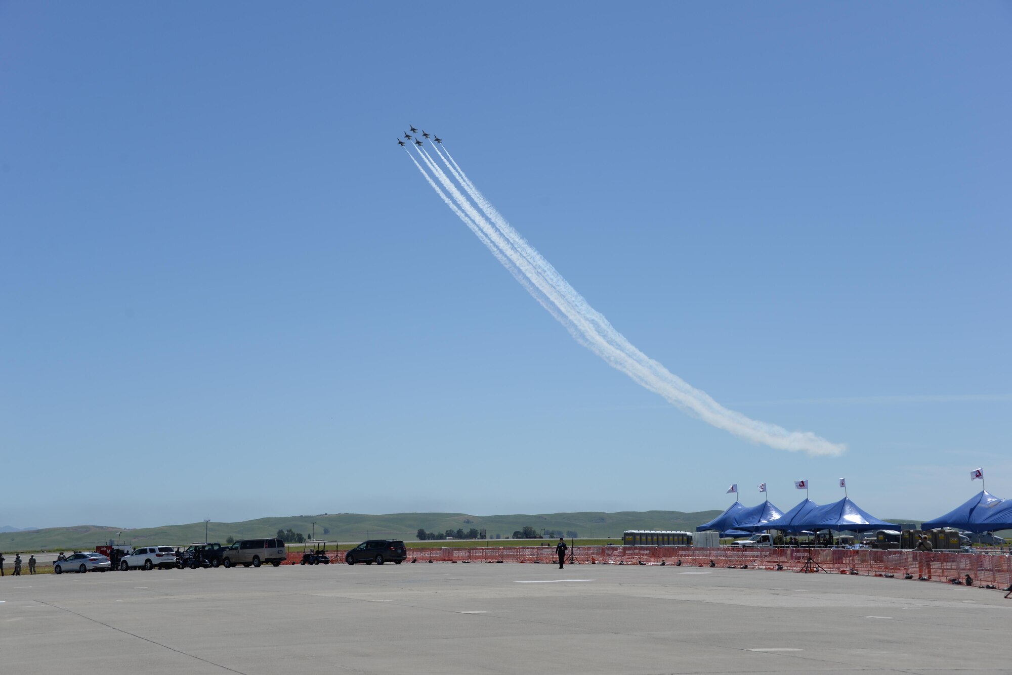 Make-A-Wish families along with families of special needs children, watch from the bleachers as the U.S. Air Force Thunderbirds practice their aerial demonstrations May 5, 2017 prior to the Wings Over Solano Air Show at Travis Air Force Base, Calif. The two-day event featured performances by the Thunderbirds, flyovers and static displays. (U.S. Air Force photo by Senior Airman Amber Carter)
