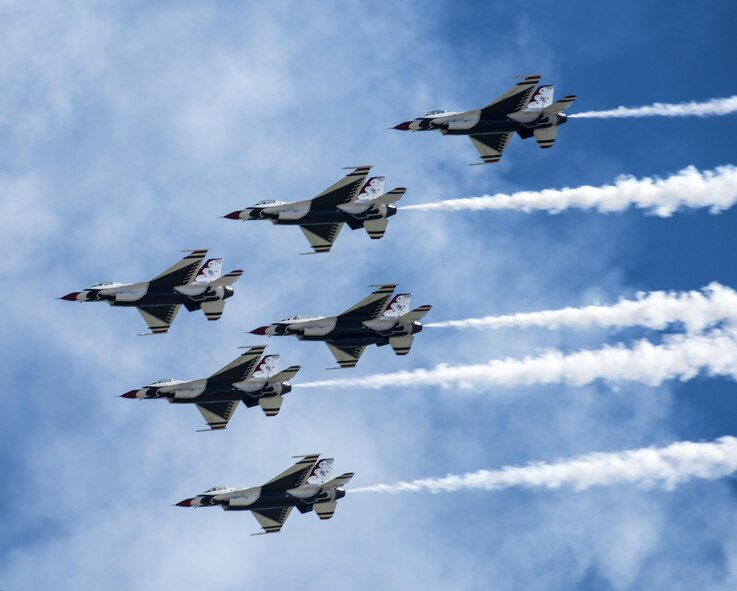 The United States Air Force Thunderbirds perform an aerial demonstration during a performance for Make-A-Wish families, as well as military families with special needs children, before the Wings Over Solano Air Show at Travis Air Force Base, Calif., May 5, 2017. The air show featured performances by the U.S. Army Golden Knights parachute team, flyovers and static displays. (U.S. Air Force photo by David Cushman)