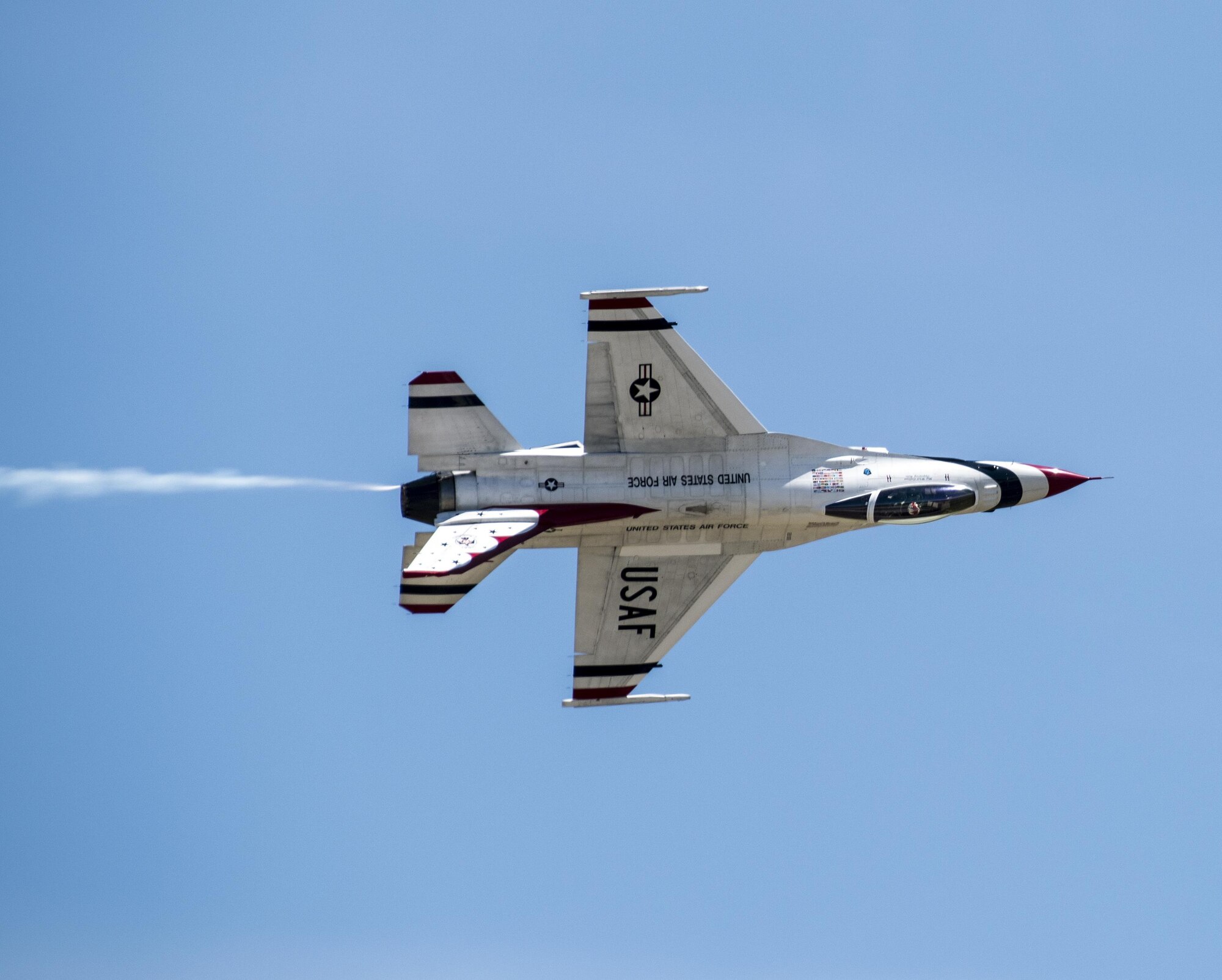 The United States Air Force Thunderbirds perform an aerial demonstration during a performance for Make-A-Wish families, as well as military families with special needs children, before the Wings Over Solano Air Show at Travis Air Force Base, Calif., May 5, 2017. The air show featured performances by the U.S. Army Golden Knights parachute team, flyovers and static displays. (U.S. Air Force photo/David Cushman)