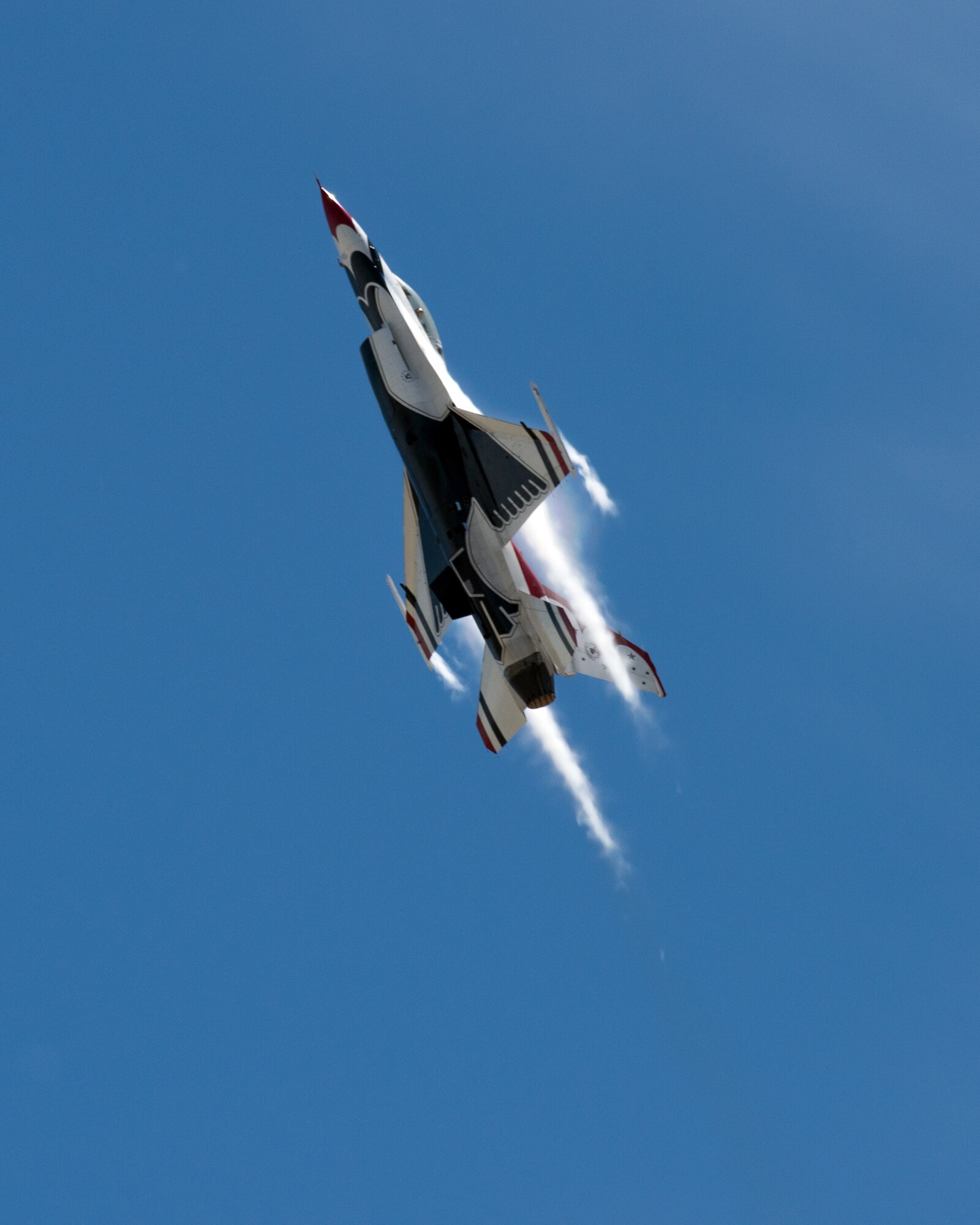 The United States Air Force Thunderbirds perform an aerial demonstration during a performance for Make-A-Wish families, as well as military families with special needs children, before the Wings Over Solano Air Show at Travis Air Force Base, Calif., May 5, 2017. The air show featured performances by the U.S. Army Golden Knights parachute team, flyovers and static displays. (U.S. Air Force photo by Louis Briscese)