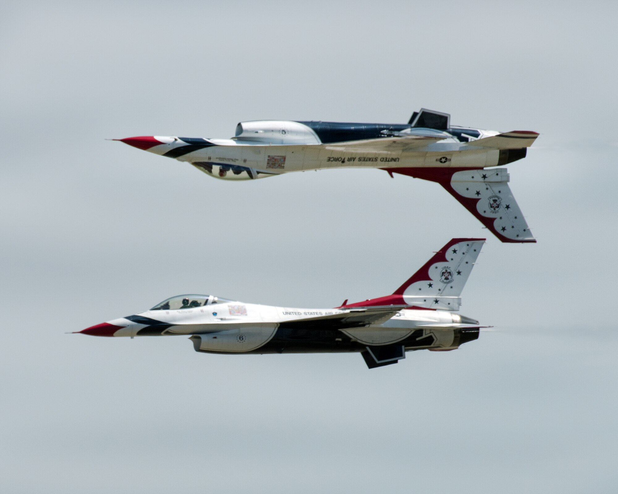 The United States Air Force Thunderbirds perform an aerial demonstration during a performance for Make-A-Wish families, as well as military families with special needs children, before the Wings Over Solano Air Show at Travis Air Force Base, Calif., May 5, 2017. The air show featured performances by the U.S. Army Golden Knights parachute team, flyovers and static displays. (U.S. Air Force photo by Louis Briscese)
