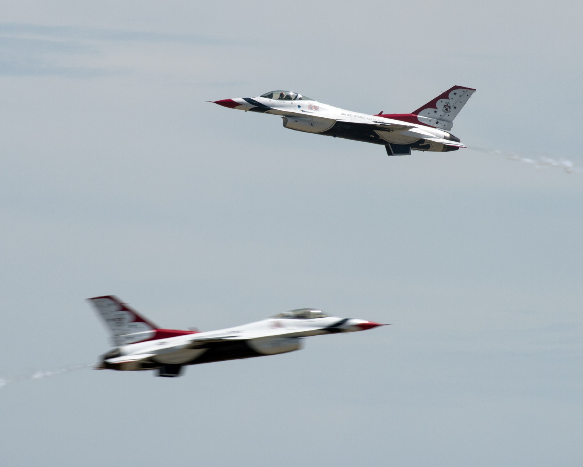 The United States Air Force Thunderbirds perform an aerial demonstration during a performance for Make-A-Wish families, as well as military families with special needs children, before the Wings Over Solano Air Show at Travis Air Force Base, Calif., May 5, 2017. The air show featured performances by the U.S. Army Golden Knights parachute team, flyovers and static displays. (U.S. Air Force photo by Louis Briscese)