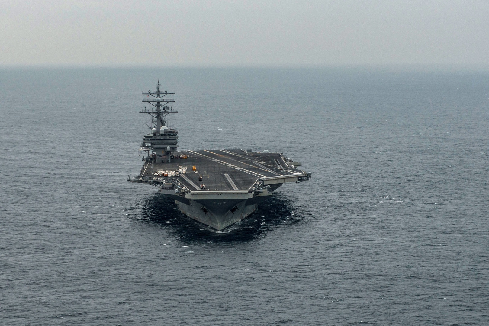 In this file photo, the Navy's only forward-deployed aircraft carrier, USS Ronald Reagan (CVN 76), patrols waters south of Japan, before returning to Commander, Fleet Activities Yokosuka, at the end of a three-month patrol in the Indo-Asia-Pacific region. During the patrol, Ronald Reagan participated in exercises Valiant Shield, Invincible Spirit and Keen Sword, designed to enhance joint military operations with partner nations throughout the region, Nov 21, 2016. The crew also completed its Unit Level Training Assessment-Sustainment and Maintenance and Material Management Assessment. Ronald Reagan, the flagship of Carrier Strike Group 5, provides a combat-ready force that protects and defends the collective maritime interests of its allies and partners in the Indo-Asia-Pacific region. 