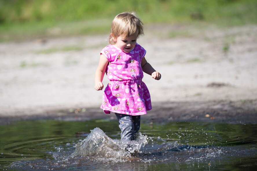 A child plays in the water during the annual Moody Mud Run, May 6, 2017, in Ray City, Ga. The Fourth Annual Moody Mud consisted of both adult and child course that challenged more than 600 participants with obstacles over 4.2 miles. (U.S. Air Force photo by Airman 1st Class Daniel Snider)