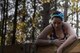 A participant of the Moody Mud Run climbs over a rope wall obstacle, May 6, 2017, in Ray City, Ga. The Fourth Annual Moody Mud consisted of both adult and child course that challenged more than 600 participants with obstacles over 4.2 miles. (U.S. Air Force photo by Staff Sgt. Eric Summers Jr.)