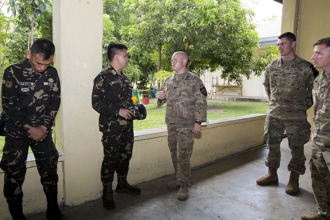 Philippine and U.S. service members meet and discus bilateral training plans for Balikatan 2017 at Ft. Magsaysay in Santa Rosa, Nueva Ecija, May 5, 2017. Balikatan is an annual U.S.-Philippine bilateral military exercise focused on a variety of missions including humanitarian and disaster relief, counterterrorism, and other combined military operations. 