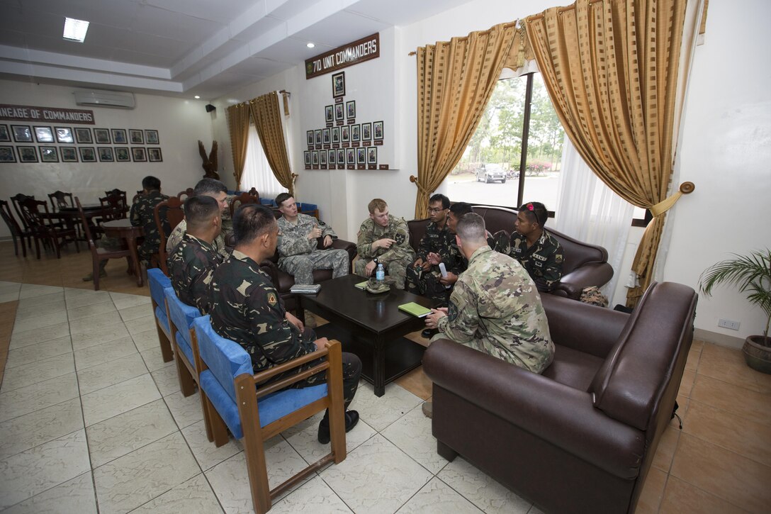 Philippine and U.S. service members meet and discuss bilateral training plans for Balikatan 2017 at Ft. Magsaysay in Santa Rosa, Nueva Ecija, May 5, 2017. Balikatan is an annual U.S.-Philippine bilateral military exercise focused on a variety of missions including humanitarian and disaster relief, counterterrorism, and other combined military operations. 