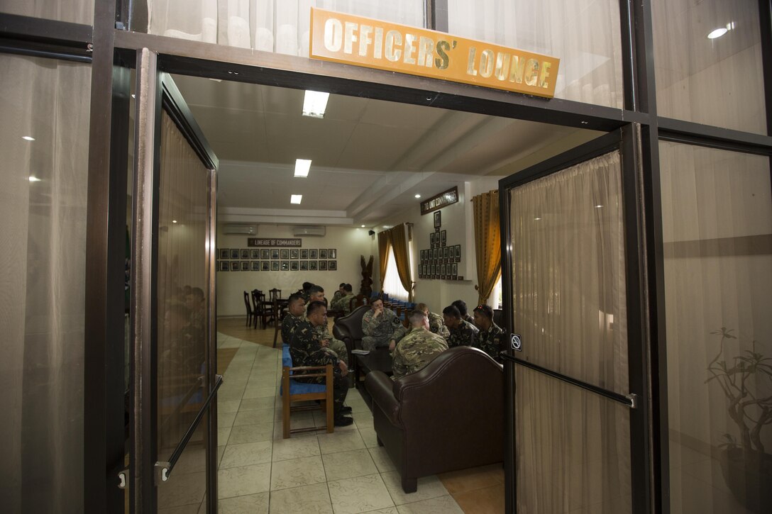 Philippine and U.S. service members meet and discuss bilateral training plans for Balikatan 2017 at Ft. Magsaysay in Santa Rosa, Nueva Ecija, May 5, 2017. Balikatan is an annual U.S.-Philippine bilateral military exercise focused on a variety of missions including humanitarian and disaster relief, counterterrorism, and other combined military operations.