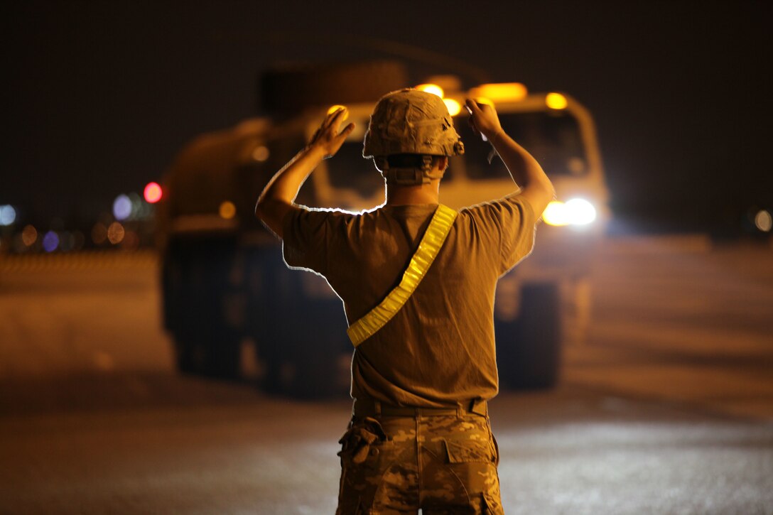 A U.S. Soldier directs a fuel truck during port operations in support of Balikatan 2017 at Subic Bay, Zambales, April 30, 2017. Balikatan is an annual U.S.-Philippine bilateral military exercise focused on a variety of missions, including humanitarian assistance and disaster relief, counterterrorism and other combined military operations.