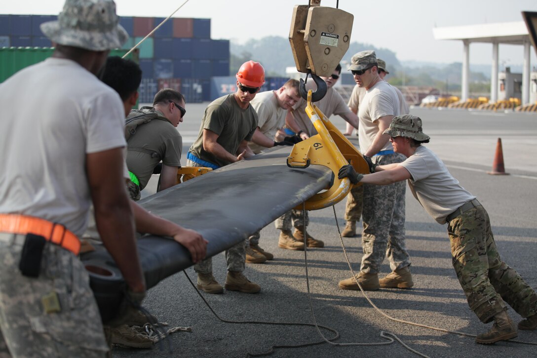 U.S. Soldiers prepare a CH-47 Chinook helicopter rotor for assembly during port operations for Balikatan 2017 in Subic Bay, Zambales, May 2, 2017. Balikatan is an annual U.S.-Philippine bilateral military exercise focused on a variety of missions, including humanitarian assistance and disaster relief, counterterrorism and other combined military operations. 