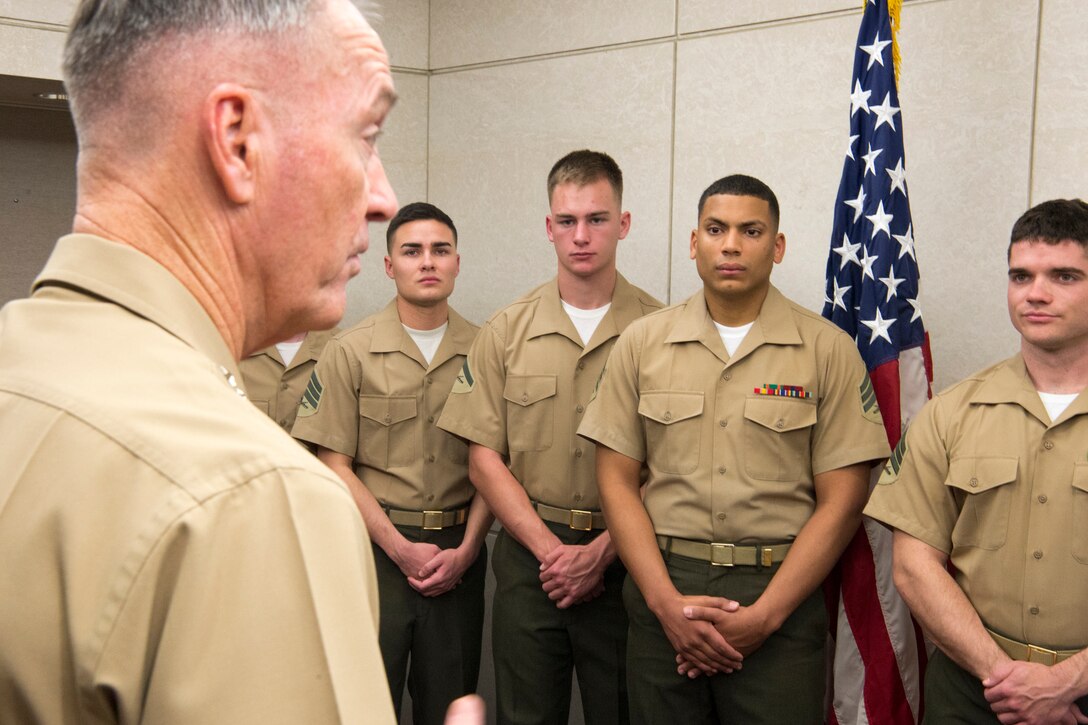Marine Corps Gen. Joe Dunford, chairman of the Joint Chiefs of Staff, and Army Sgt. Maj. John W. Troxell, not pictured, senior enlisted advisor to the chairman of the Joint Chiefs of Staff, speak to Marine security guards assigned to the U.S. Embassy in Tel Aviv, Israel, May 8, 2017. DoD photo by Navy Petty Officer 2nd Class Dominique A. Pineiro