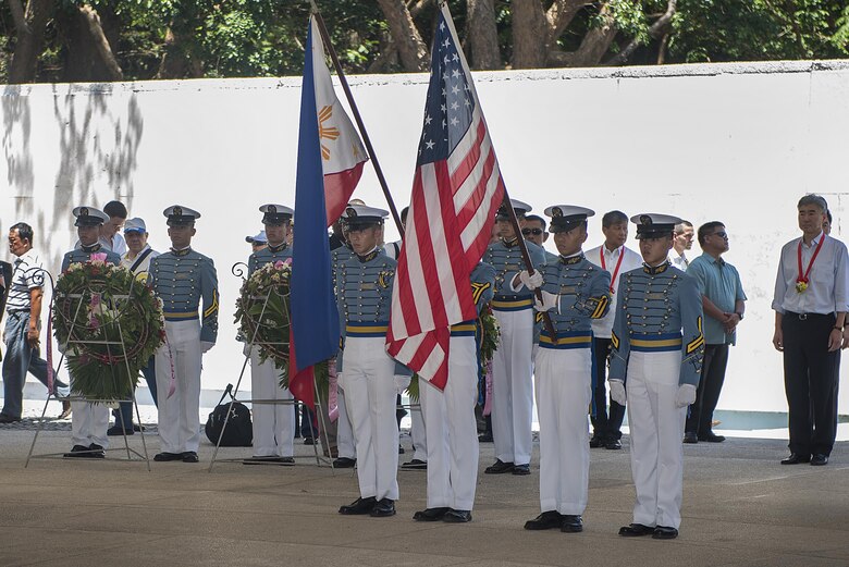 Maritime Academy of Asia and the Pacific cadets display the Philippine and U.S. flags at a ceremony to mark the 75th anniversary of the fall of Corregidor to the Japanese during World War II on Corregidor, Cavite, May 6, 2017. The ceremony was held to commemorate the Marines, Soldiers, Sailors and Filipinos who fought and sacrificed to defend the Philippines during World War II. 