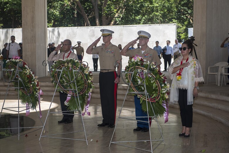 Philippine Secretary for National Defense Delfin Lorenzana, U.S. Marine Brig. Gen. John Jansen, middle left, and Col. Kevin A. Norton honor the fallen with wreaths during a ceremony to mark the 75th anniversary of the fall of Corregidor to the Japanese during World War II on Corregidor, Cavite, May 6, 2017. Jansen is the commanding general of 3rd Marine Expeditionary Brigade and deputy commanding general of III Marine Expeditionary Force. Norton is the commanding officer of 4th Marine Regiment. The ceremony was held to commemorate the Marines, Soldiers, Sailors and Filipinos who fought and sacrificed to defend the Philippines during World War II. 