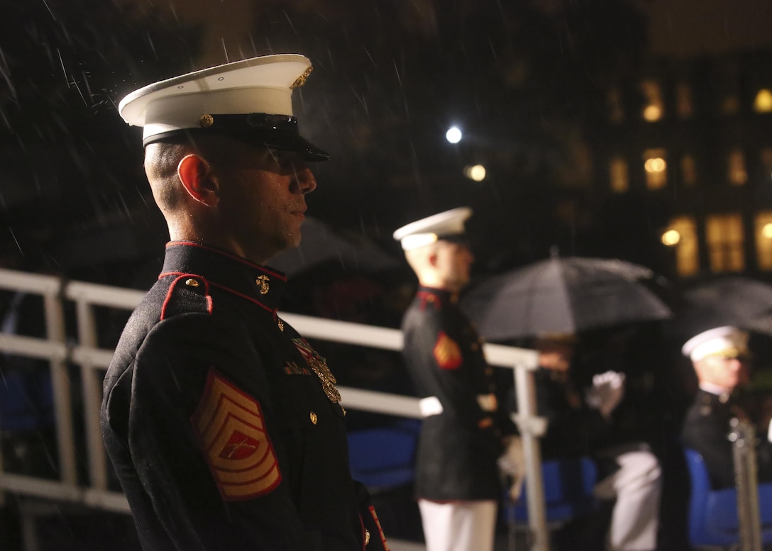 Master Sgt. Hector Vicente, parade staff senior, stands at ceremonial position during a Friday Evening Parade at Marine Barracks Washington D.C., May 5, 2017. The guests of honor for the parade were the Honorable Paul Cook, California’s 8th Congressional District Congressman, the Honorable Jack Bergman, Michigan’s 1st Congressional District Congressman, and the Honorable Salud Carbajal, California’s 24th Congressional District Congressman. The hosting official was Gen. Glenn Walters, assistant commandant of the Marine Corps.(Official Marine Corps photo by Lance Cpl. Damon Mclean/Released)