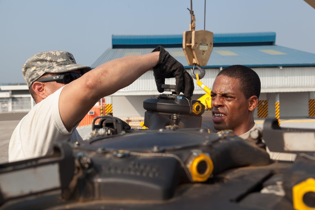 U.S. Army Staff Sergeant Gilbert Serrano (Left) and Sergeant Reginald Brooks of the 325th Aviation Support Battalion, 25th Infantry Division, locks in the rotor of a CH-47 Chinook during Balikatan 2017 in Subic Bay, Philippines on May 02, 2017.  Balikatan is an annual U.S-Philippine military bilateral exercise focused on a variety of missions, including humanitarian assistance, disaster relief, and counterterrorism. 