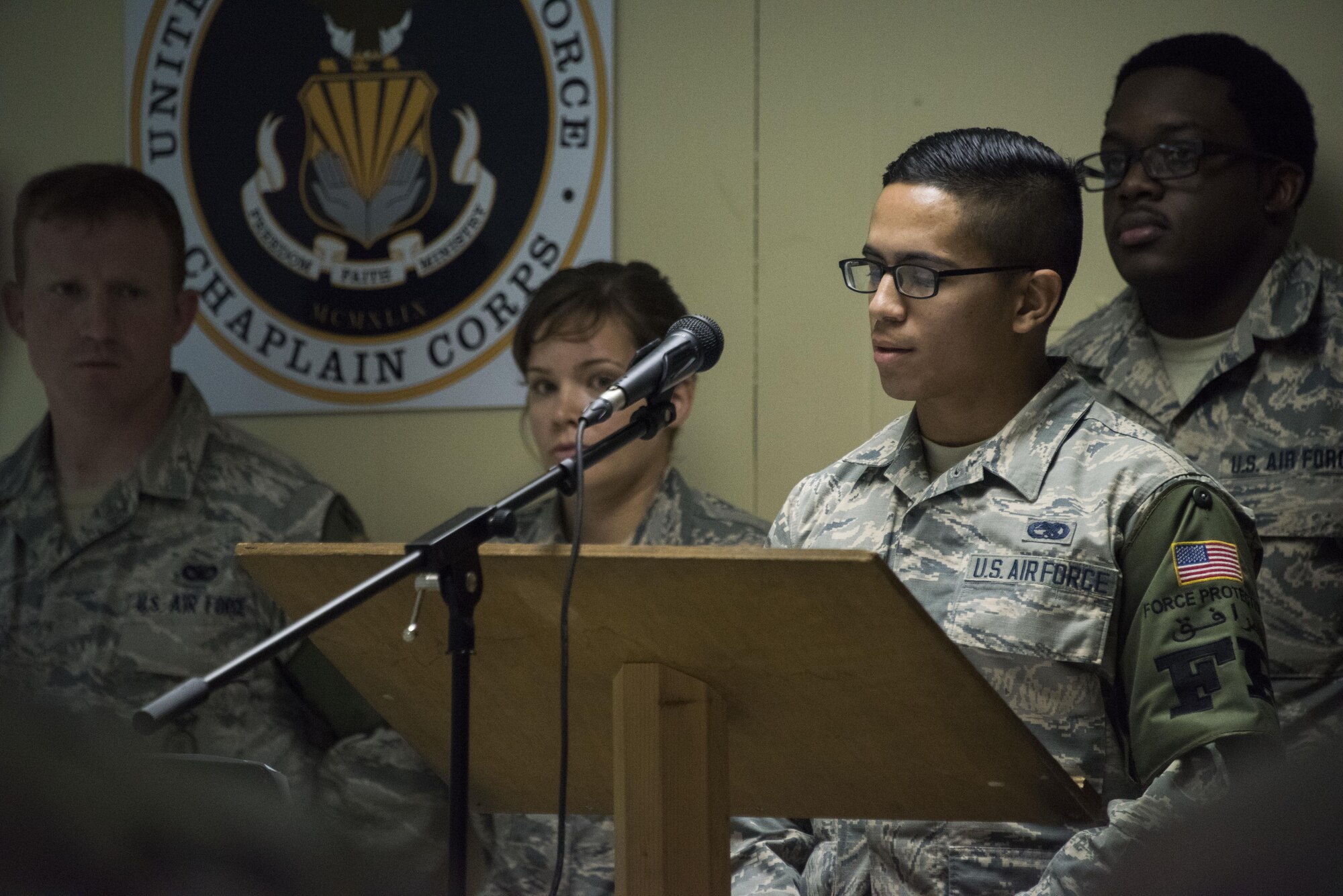 Airman Jonathan Quinones, a 386th Expeditionary Civil Engineer Squadron, Force Protection member, reflects on the role that spiritual resiliency plays in helping him persevere in completing the mission, during a Faith Works leadership luncheon, at an undisclosed location in Southwest Asia, May 4, 2017. The U.S. Air Force Chaplain Corps recently rolled out the Faith Works campaign to inform Airmen about the overwhelming evidence regarding the positive relationship between spirituality, religion, and health. (U.S. Air Force photo/ Tech. Sgt. Jonathan Hehnly)
