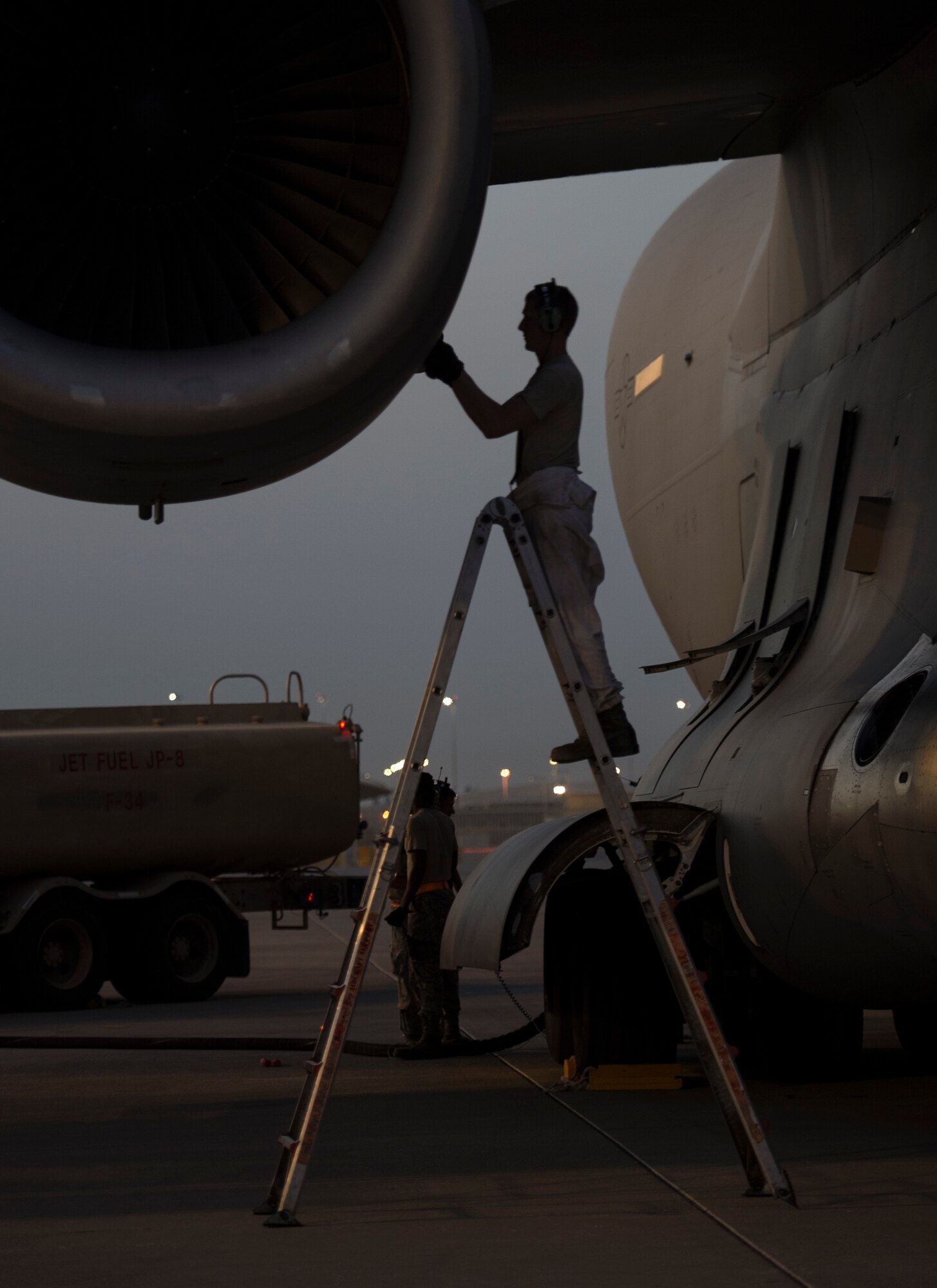 U.S. Air Force Airmen with the 379th Expeditionary Maintenance Squadron perform a post-flight inspection on a C-17 Globemaster III at Al Udeid Air Base, Qatar, May 4, 2017. The inspection being performed on the C-17 Globemaster III is accomplished on a regular schedule in order keep the aircraft mission ready.  (U.S. Air Force photo by Tech. Sgt. Amy M. Lovgren)