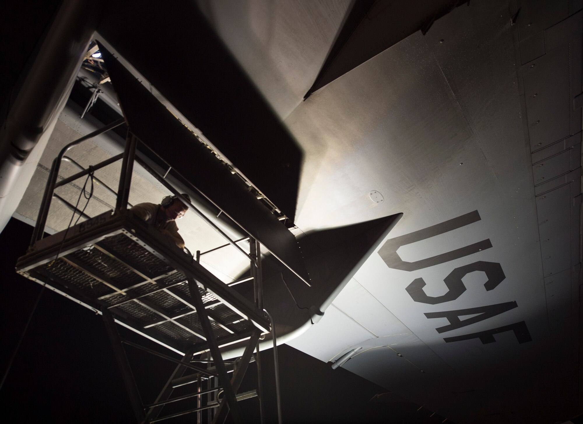 U.S. Air Force Airmen with the 379th Expeditionary Maintenance Squadron perform a post-flight inspection on a C-17 Globemaster III at Al Udeid Air Base, Qatar, May 4, 2017. The inspection being performed on the C-17 Globemaster III is accomplished on a regular schedule in order keep the aircraft mission ready.  (U.S. Air Force photo by Tech. Sgt. Amy M. Lovgren)