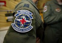 Capt. Jeana Angulo, 86th Aeromedical Evacuation Squadron flight nurse, wears her squadron patch during a patient movement exercise on Ramstein Air Base, May 4, 2017. The 86th AES practiced transporting simulated patients in a realistic setting, ensuring that they are prepared to perform real-world aeromedical evacuation at a moment's notice.