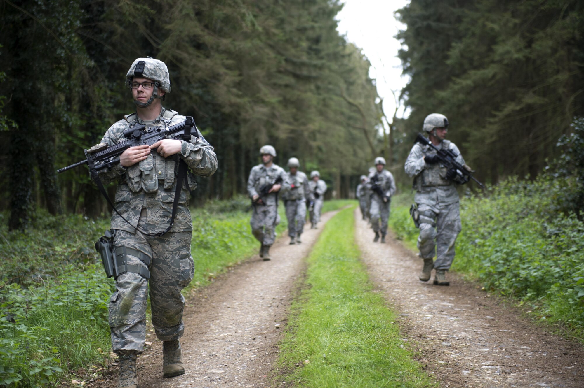 48th Security Forces Squadron Airmen move in formation during a training exercise at the Stanford Training Area, England, April 21. During the training, junior Airmen were given a chance to lead groups comprised of higher-ranking security forces members. (U.S. Air Force photo/Senior Airman Malcolm Mayfield)