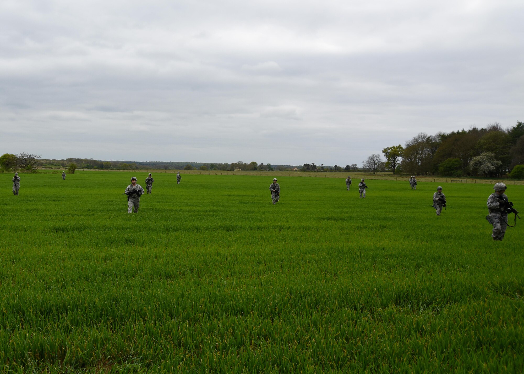 48th Security Forces Airmen go out on patrol during a training exercise at the Stanford Training Area, England, April 21. The two-day training exercise included practicing skills such as patrolling, clearing buildings and improvised explosive devise familiarization. (U.S. Air Force photo/Airman 1st Class Abby L. Finkel)