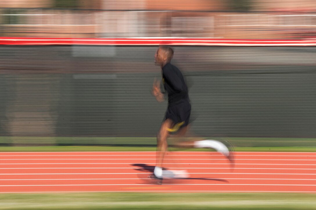 An Army reservist participates in the two-mile run during the Army Physical Fitness Test on a track in East Point, Ga., May 6, 2017. Army photo by Staff Sgt. Ken Scar