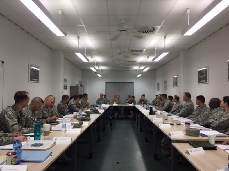 Col. Thomas Cooper, 521st Air Mobility Operations Wing commander, provides opening comments and expectations to all of the Squadron Leadership Orientation Couse attendees on Ramstein Air Base, Germany, April 24, 2017. The SLOC allowed inbound commanders to spend time with their directors of operations and superintendents before taking command of various en route air mobility units throughout U.S. Air Forces in Europe and Air Force Central Command. (Courtesy photo)