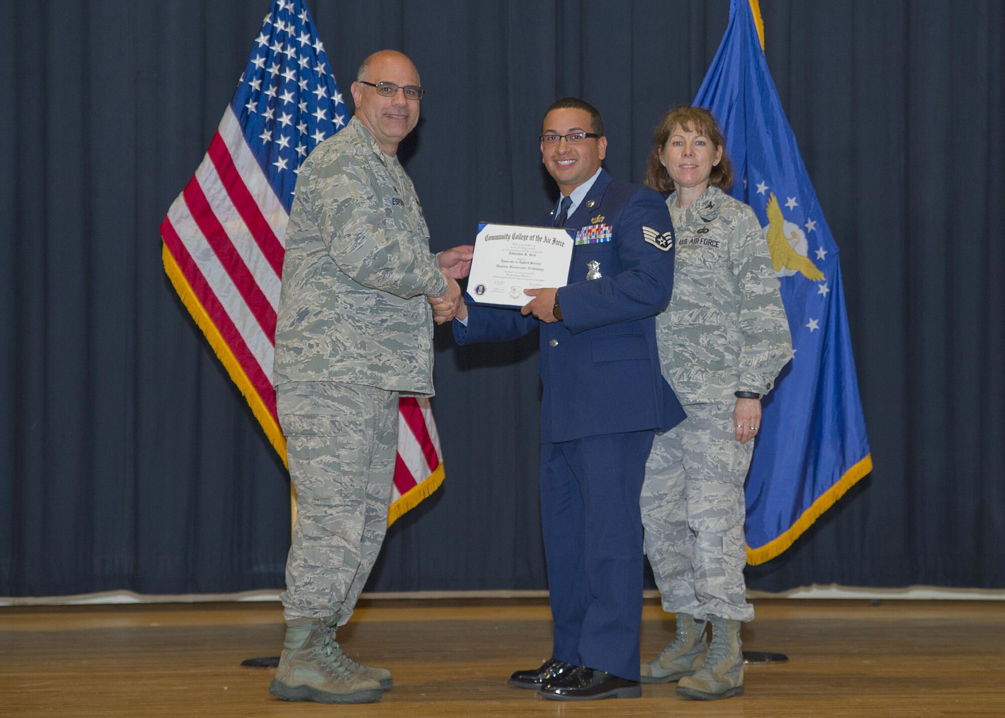 Fifty-four Airmen from the 514th Air Mobility Wing received their associate degrees from the Community College of the Air Force during a ceremony at Timmerman's Hall May 5.The CCAF is a federal program granting two-year Associate of Applied Science (AAS) degrees in five broad career areas and 67 specific degree programs. 

The graduates are as follows:

Corinne Aimable, 514 OSS
Fredy Aleman, 514 CES
William Almestica, 514 AMXS
Yonas Barkie, 714 AMXS
Pamela Benitas, 514 CES
Catherine Bensken, 514 AES
Ainsley Brimm, 714 AMXS
Steven Cabrera, 732 AS
Daniel Condo, 514 AMW
Lorraine Cuff, 88 APS
Horace Daughty, 35 APS
James Devlin Braswell, 35 APS
Tyler Drapeau, 514 MXS
Ernest Deux, 35 APS
Alicia Evangelist, 514 ASTS
Christian Faust, 514 MXS
Krystle Gladden, 514 AES
David Gold, 514 CES
Dana Granteed, 76 ARS
Reuel James, 35 APS
Brandon Jenkins, 514 AES
Ricardo Johnson, 714 AMXS
Michael Killebrew, 714 AMXS
Kimberlee Lamarre, 514 FSS
Brando Li, 78 ARS
Adam Ligon, 514 AMW
Nunzio Malara, 714 AMXS
Anita Maldonado, 514 AES
Rosa Mayi Cruel, 514 AMW
Shaniya Moore, 514 FSS
Luis Morales, 35 APS
Rocco Morello, 514 AES
Timothy Mullin, 732 AS
Jessica Navarro, 514 ASTS
Yamineth Oleary, 514 AMW
Joseph Onate, 714 AMXS
Curtis Palmer, 78 ARS
Jennifer Pichardo, 514 LRS
Matthew Powis, 514 CES
Elizabeth Pritchard, 514 LRS
Jennifer Quinones, 514 ASTS
Kenneth Rivera Ithier, 514 SFS
Jimmy Rogue, 714 AMXS
Shana Ross, 514 FSS
Rajpert Smith, 514 CES
Denise Spencer, 76 ARS
David Stroebel, 88 APS
Erika Swineburg, 514 FSS
David Tingle, 514 SFS
Brandon Turner, 514 FSS
Chester Tyson, 714 AMXS
Hector Vargas, 714 AMXS
Carolina Vergara, 35 APS
Shantel Williams, 514 FSS
