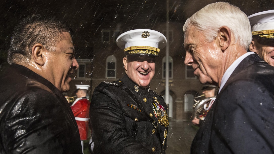From left, the Honorable Salud Carbajal, United States representative, California’s 24th Congressional District; U.S. Marine Corps Gen. Glenn M. Walters, 34th assistant commandant of the Marine Corps and the Honorable Jack W. Bergman, United States representative, Michigan’s 1st Congressional District shake hands after an evening parade at Marine Barracks Washington, Washington, D.C., May 05, 2017. Evening parades are held as a means of honoring senior officials, distinguished citizens and supporters of the Marine Corps.