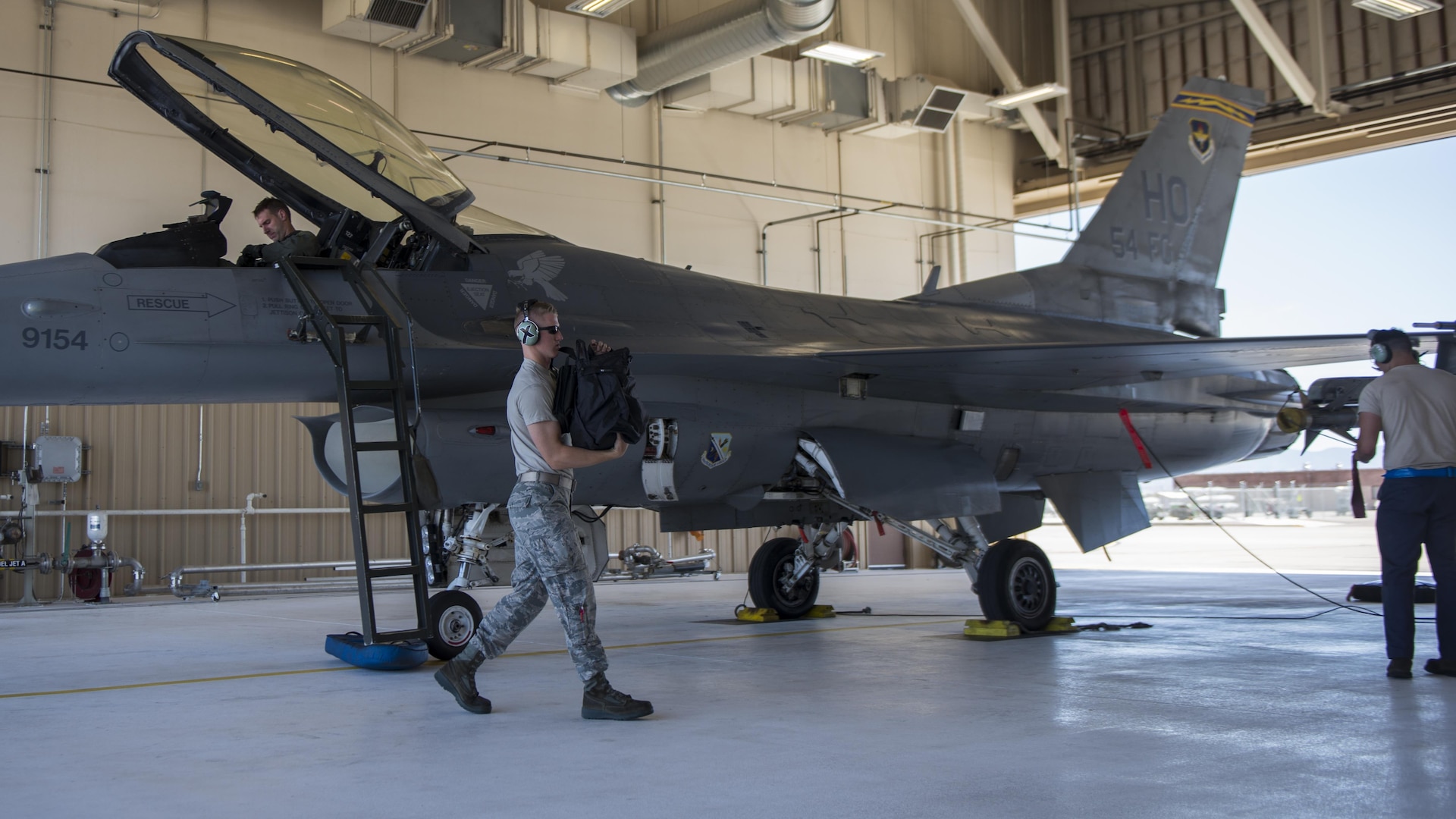 Airman 1st Class Derek King, a 54th Aircraft Maintenance Unit F-16 crew chief, performs recovery operations on an F-16 Fighting Falcon at Holloman Air Force Base, N.M. on May 4, 2017. “The most rewarding aspect of being a crew chief is simply watching the F-16s take off, and knowing that you had hands on that jet—that you might have been the one that launched it out or you might have done some maintaining on it,” King said. (U.S. Air Force photo by Airman 1st Class Alexis P. Docherty) 