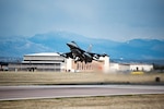 An F-16 Fighting Falcon aircraft from the 120th Fighter Squadron, 140th Wing, takes off at Buckley Air Force Base, Colorado on its way to Kadena Air Base, Japan for a deployment in support of the Theater Security Package.