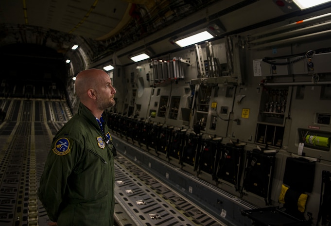 Leon Logothetis, TV personality and author of The Kindness Diaries, views instruments in the cargo bay of a C-17 Globemaster III during his visit to Joint Base Charleston, S.C, May 5, 2017. Logothetis flew with the 14th Airlift Squadron to receive a firsthand look at the mission of the 437th Airlift Wing and Air Mobility Command.